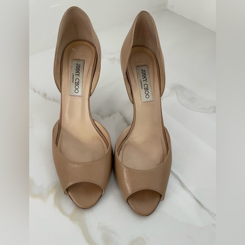 Jimmy Choo nude pumps. Never go out of style, perfect heel height at 3 1/4 in.